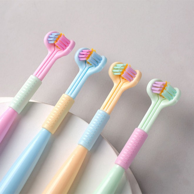 Creative three-sided soft bristle children's toothbrush