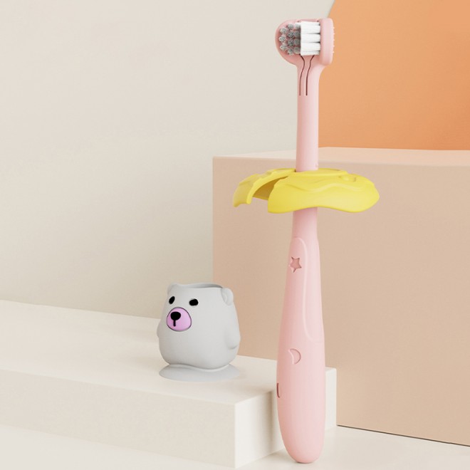 Three-sided soft bristle children's toothbrush with animal bottom