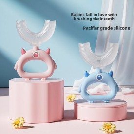 Gripable cartoon monster handle children's toothbrush